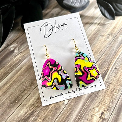 Big dangle earrings bright stars