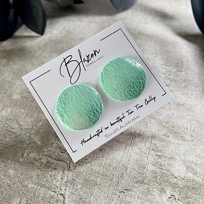 Big stud earrings mint green