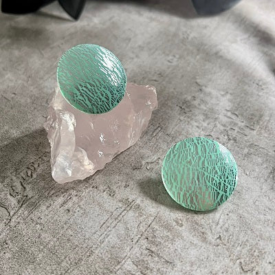 Big stud earrings mint green