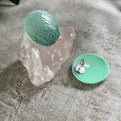 Big stud earrings mint green