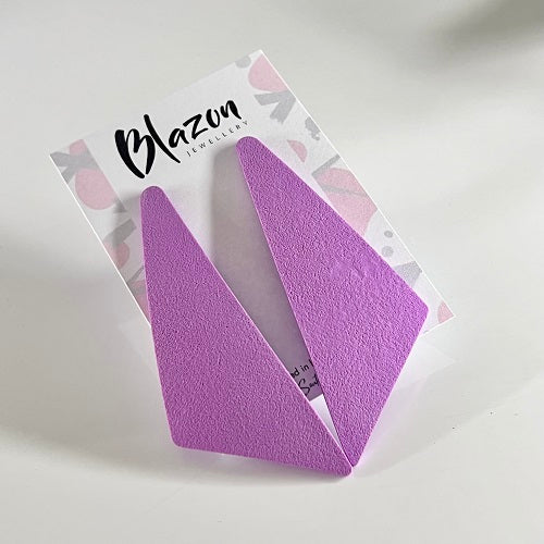 Big triangle stud earrings purple