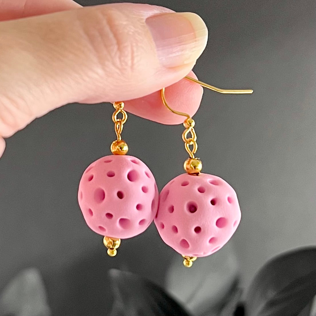 Light pink coral balls medium drop earrings closeup