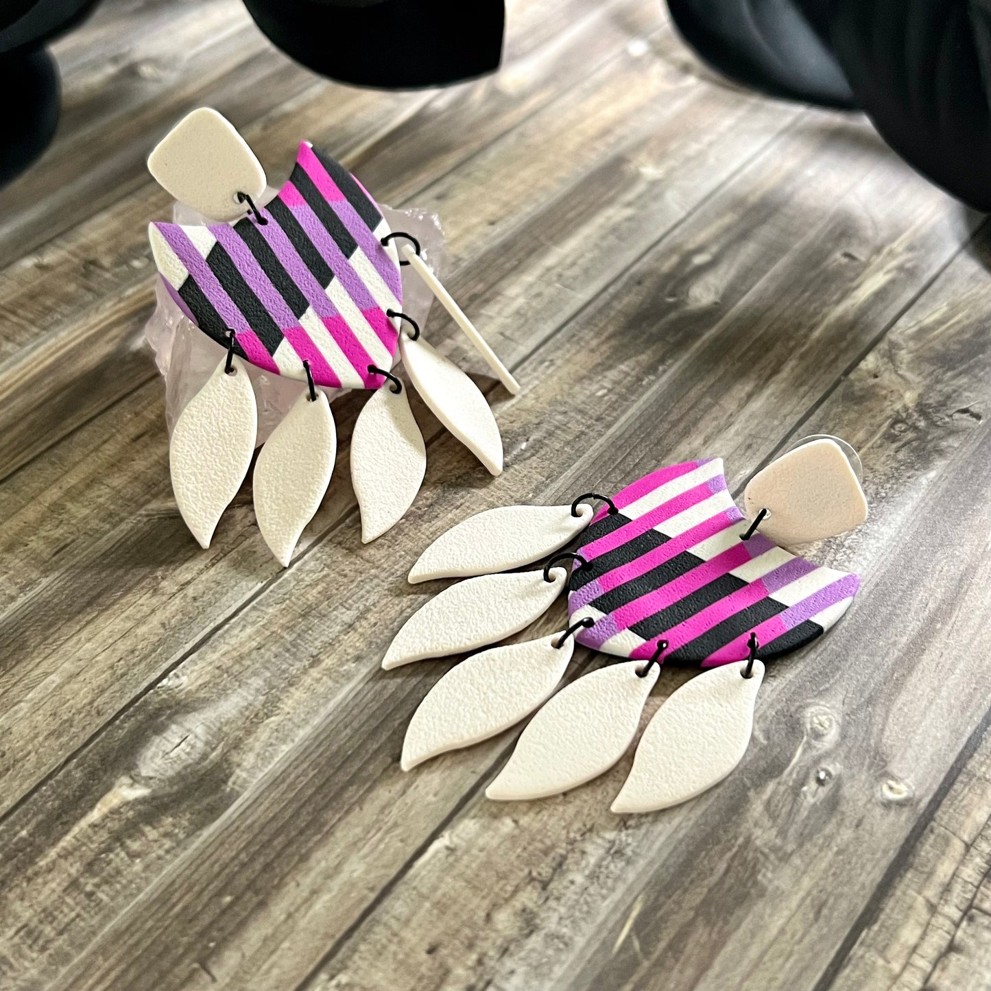 Extra large, dangly white feathered shields, 90s pink purple black white stripes