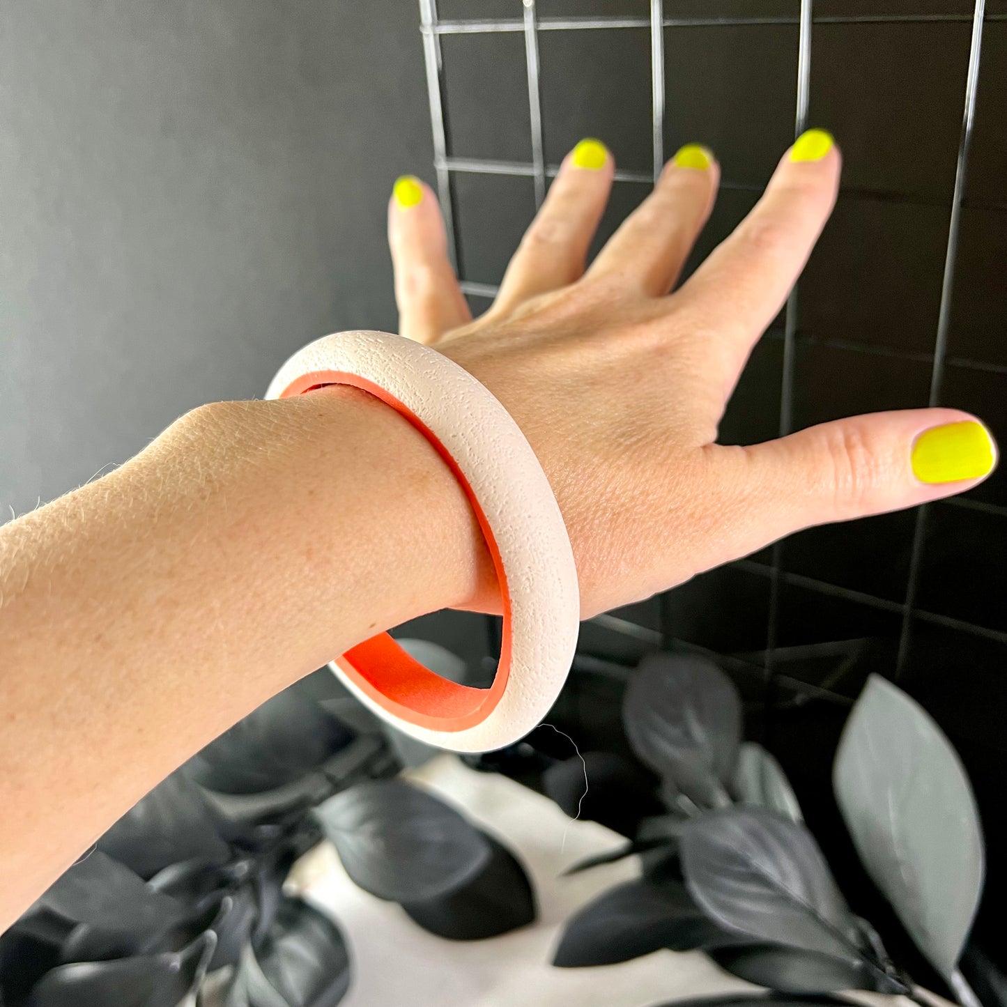 white and orange clay stackable bangle
