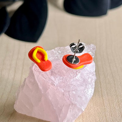 stud earrings thongs orange