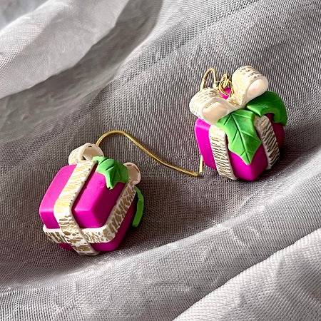 Christmas present novelty dangle earrings pink